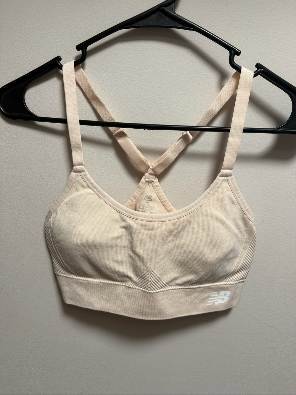 New Balance Women's Light Pink Seamless Racerback Sports Bra IEC M